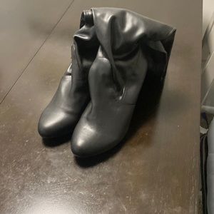 Lane Bryant round toe thigh high heels.